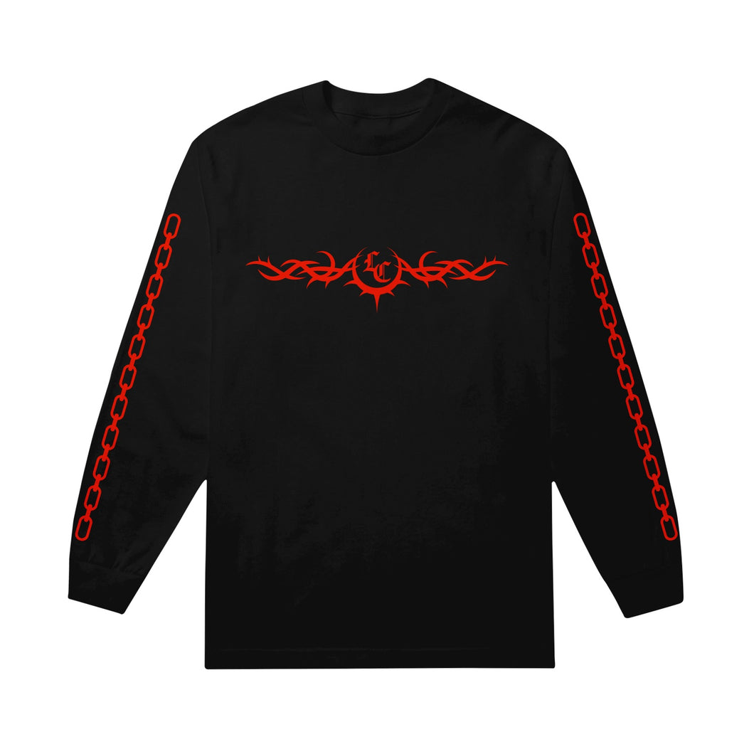Black longsleeve shirt on a white background. The sleeves feature a red chain link going down each sleeve. The front of the shirt has the letters L and C printed in red on the center chest of the shirt, with a sideways crescent moon with spikes on it. Attached to the moon stretching from armpit to armpit is a thorn-like line design in red.